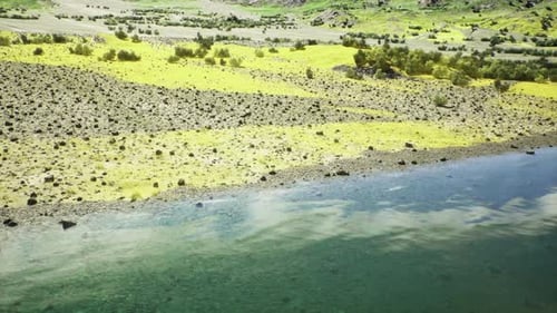 Mountain Shoreline Scenery Sweeping Water Along Rugged Coast
