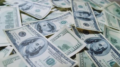 Extreme CloseUp of One Hundred Dollar Bills in Slow Motion