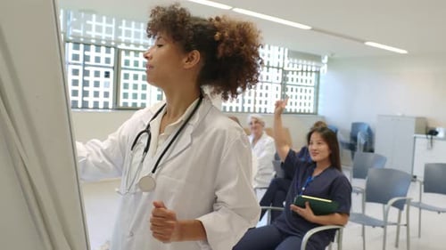 Medical Professional Giving Presentation to Students