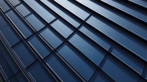 Abstract architectural facade with dark, overlapping rectangular panels