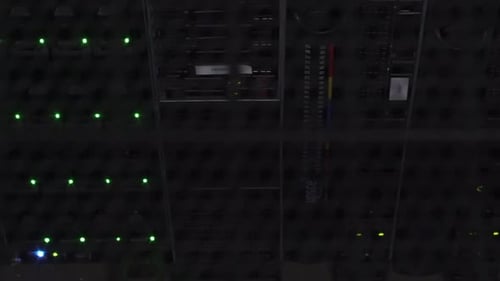 Futuristic Data Center Servers with Blinking Green Lights