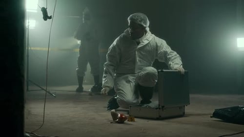 Forensic Scientists Investigating Crime Scene at Night