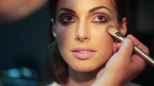 Makeup Artist Applying Eyeshadow for Beauty Make Up Model Closeup Eyes Eyeshadow Beautiful Young