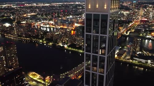 Aerial view of vibrant cityscape and bridge, United States.