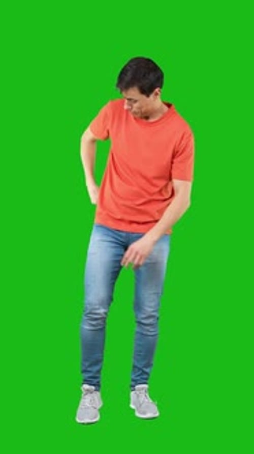 Cheerful Young Guy Taking Selfie on Smartphone Isolated on Green Background