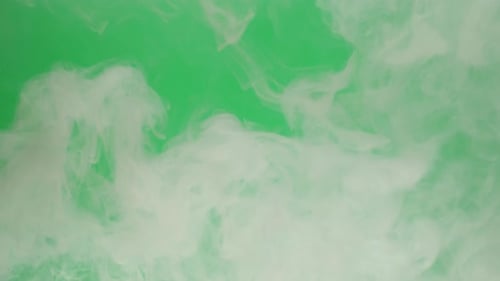 Smoke on Green Chroma Key Background Smoking Steam Clouds of Vapour Closeup Burning Fog