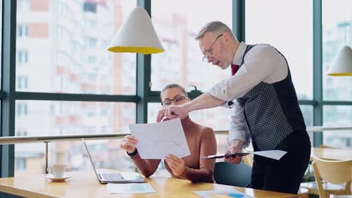 Business Team Analyzing Data in Modern Office