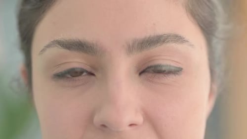 Close Up of Blinking Female Eyes