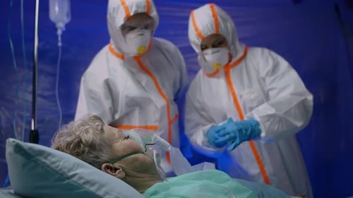 Doctors and Infected Patient in Hospital, Coronavirus Concept