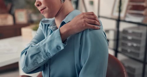 Creative, woman and massage neck pain in office from bad posture, muscle strain and burnout