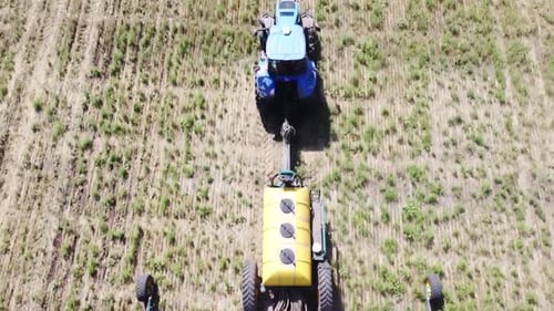 Blue Tractor O.A. Planting Canola On No Till Field