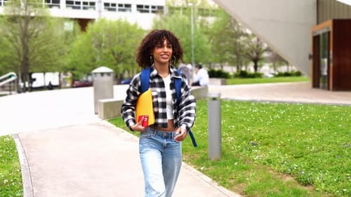 Happy African American College Student Walking on Campus