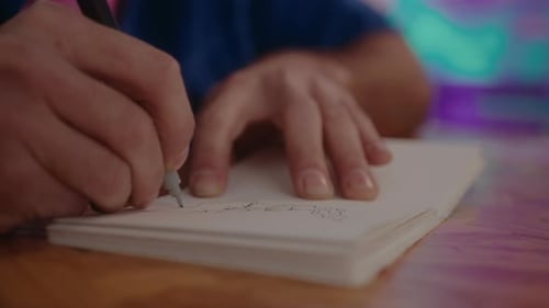 Close Up Drawing in a Notebook