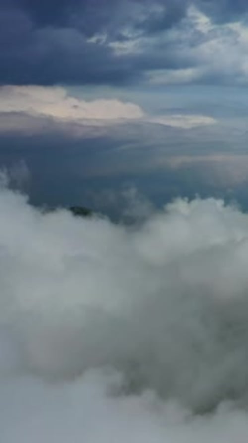 Aerial view of clouds and mountains