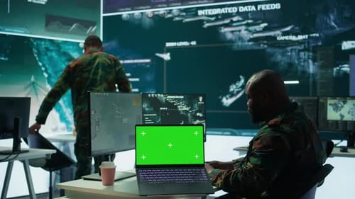 IT Expert Collecting Real Time Information Next to Isolated Chroma Key Screen