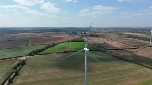 Aerial view of wind turbines in field, United Kingdom.