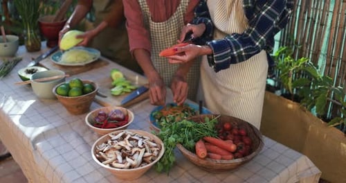Friends Preparing Fresh Vegetables in a Tropical Setting