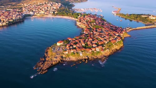 Beautiful Aerial View Of A Sun Drenched Coastal Peninsula Town