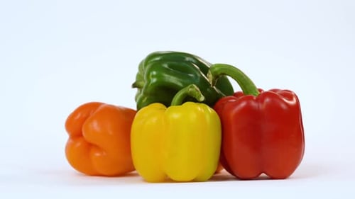 Sweet bright colors pepper on white. Advertisement for supermarket. Copy space.