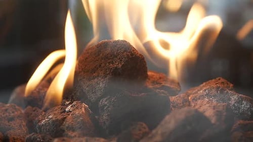 Fire Burning on Stones Creates Warm Ambiance