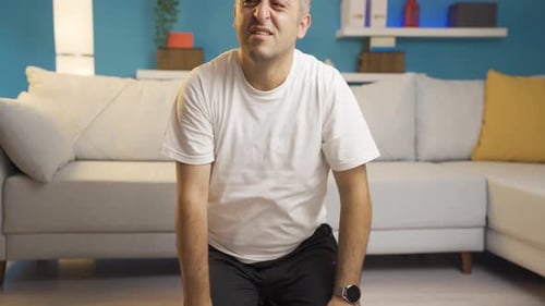 Man on Floor with Pain, Fitness Injury