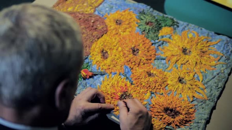 Cover for Upper View Man Makes Van Gogh Picture Copy with Play Dough