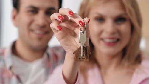 Happy Couple Show Home Key Close Up Family Buy New House People Move Into Flat