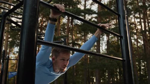 Man Doing Bodyweight Exercises in a Park