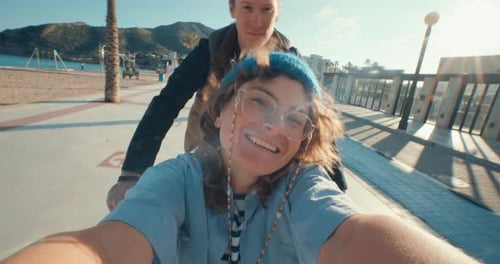 Couple on Cargo Bike Ride on Beach Street