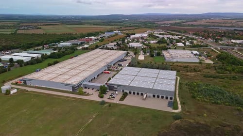 Aerial View of Large Logistics Warehouses in an Industrial Park
