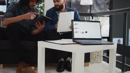 Men Working Together in an Office Space