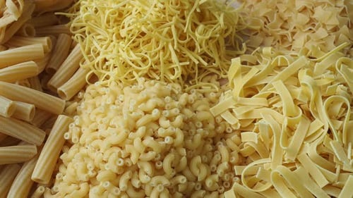 Variety of Uncooked Pasta Piled Together