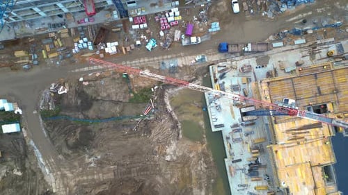 Aerial Flight Over a New Constructions Development Site. Urban Construction Site, Aerial View. High