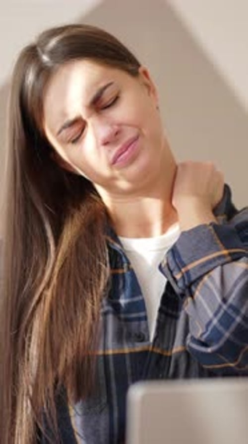 Woman Student or Office Worker Feeling Neck Ache After Long Work with Computer Vertical Video