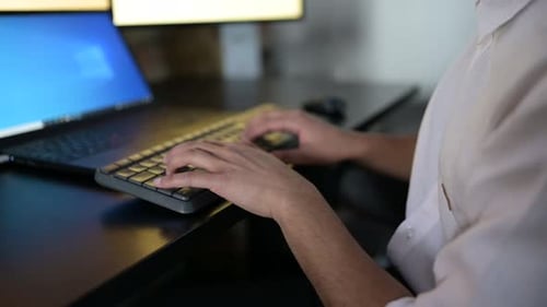 Close Up Businessman Typing At Keyboard Working At Laptop In Office Slow Motion