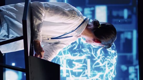 Young Adult Working with AI Technology in Lab