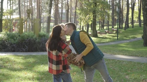 Happy Family in Autumn Park