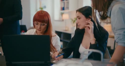 Employees Discussing in Meeting at Office