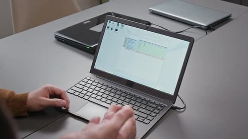 Teacher Explaining Spreadsheets in Computer Literacy Class