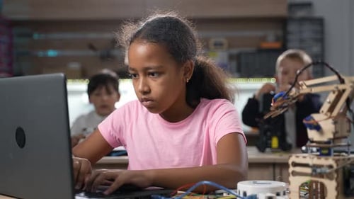 Portrait of Smart African School Girl Programming