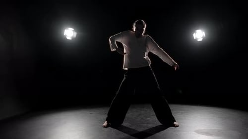 Dancing Female Silhouette in Contour Light Slender Lady on Stage Slow Motion Professional Dancer