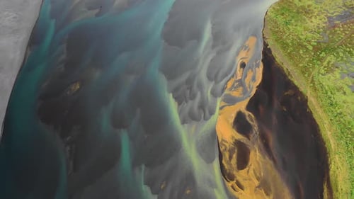 Aerial view of a river along the coast in Iceland.