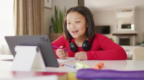 Child Engaged in Online Learning at Home