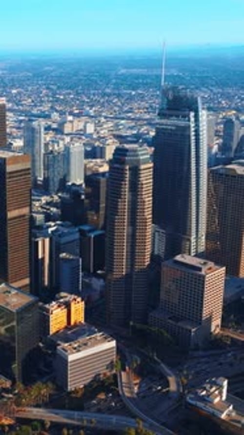 Gorgeous skyscrapers surrounded by busy traffic roads in Los Angeles, USA.