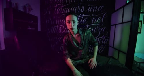 Milan/Italy-01.02.2019:Slow motion of young short hair female master of the art of tattooing with