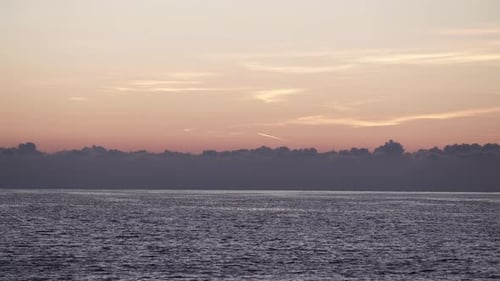 Sky after Sunset over Sea. Time Lapse