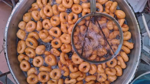 Delicious Traditional Turkish Dessert Lokma Donut Dough Cooking In Oil 22