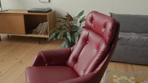 Red Leather Armchair in Comfortable Office