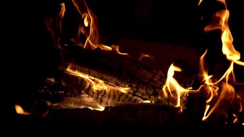 Burning Wood Fire in Dark Home Setting