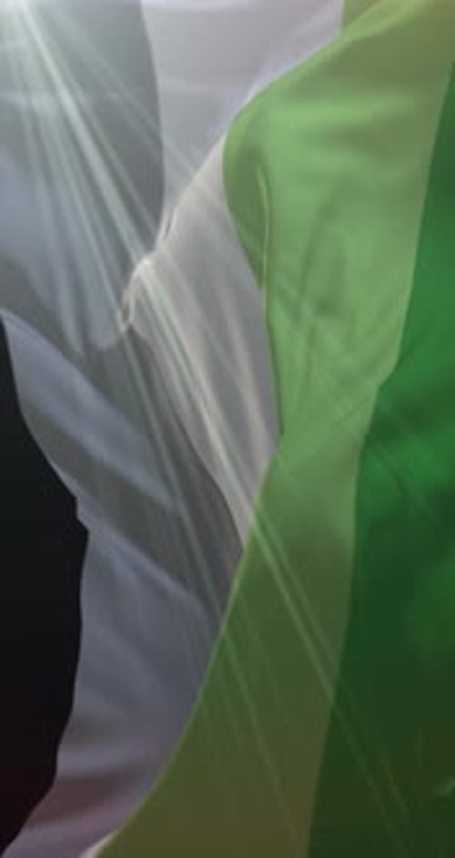 Waving Green and White Fabric with Natural Sun Rays Background